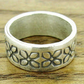 Textured silver flower ring